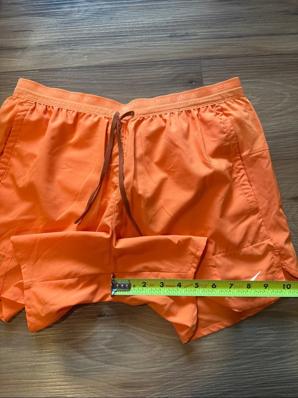 Nike Orange Athletic Running Shorts with Reflective Swoosh